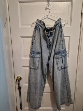Calvin Klein Light Blue Denim Jeans with Brown Leather Patch